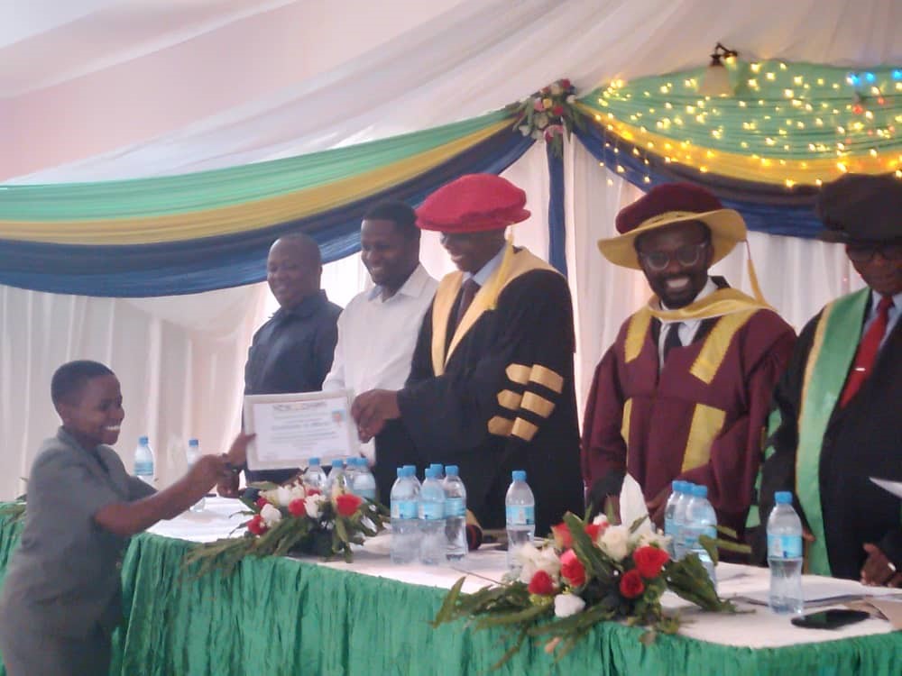 Student receiving a certificate of leadership